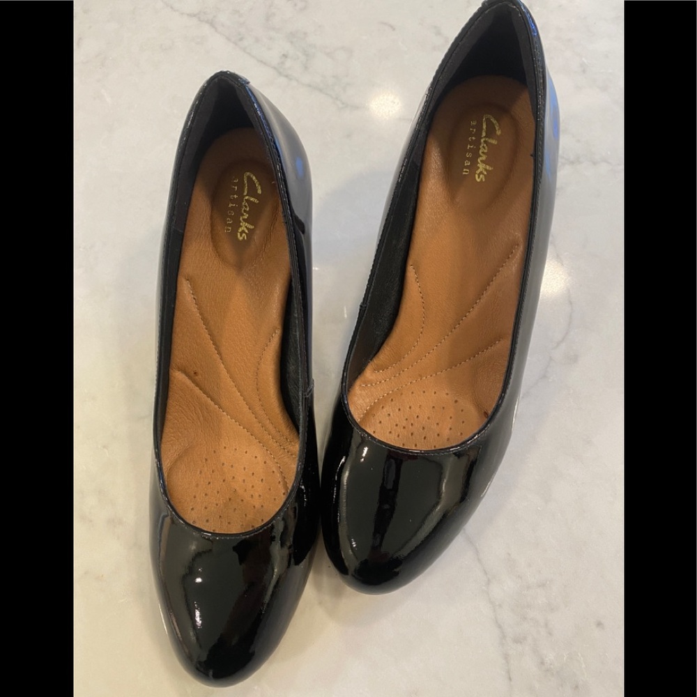 Clarks black patent leather pumps. Only worn a couple of times. Look new!
